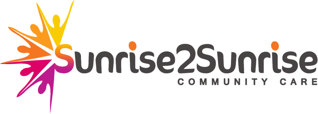 Logo of Sunrise2Sunrise Community Care featuring a burst of colors transitioning from orange to pink on the left side. The text "Sunrise2Sunrise" is written in a bold, modern font with "Community Care" in smaller letters beneath it, aligned to the right.